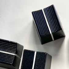 Tappo scorrevole per macchina