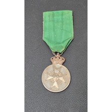 Antica medaglia argento ordine