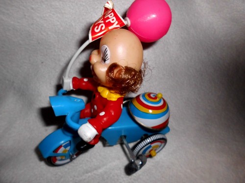 Clown con triciclo giocattolo - clown,