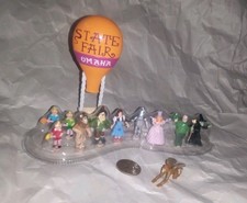 12 figurine Mattel Polly