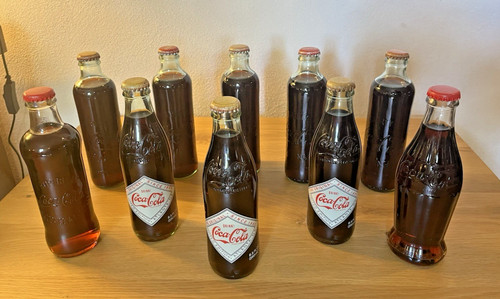 Bottiglie coca cola - 10,
