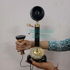 Antico telefono in ottone a