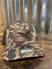 Cappello mimetico pelle