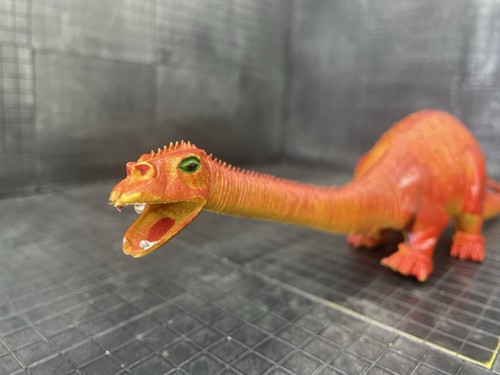 Brontosauro dai denti - , a