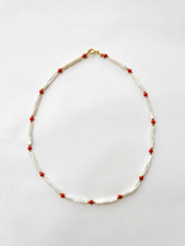 Collana girocollo con cilindri