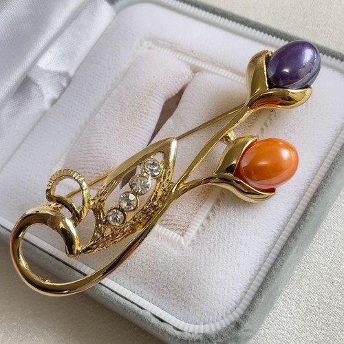 Spilla vintage con fiori tono