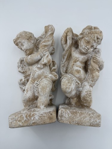 Coppia sculture pietra - in,