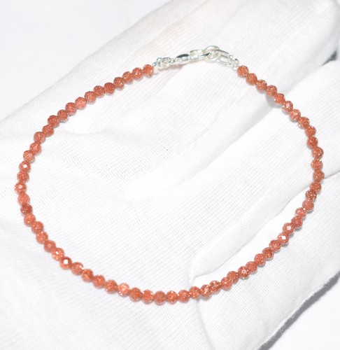 Bracciale rotondo con - , perline