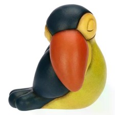 Tucano Thun medio, accovacciato