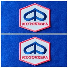 A Pair Of Vespa Scooter