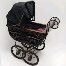 Carrozzina antica per bambole