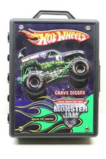 11 Hot Wheels Monster Jam Trucks + Custodia Scavatore di Tombe Monster Truck Serie Mattel