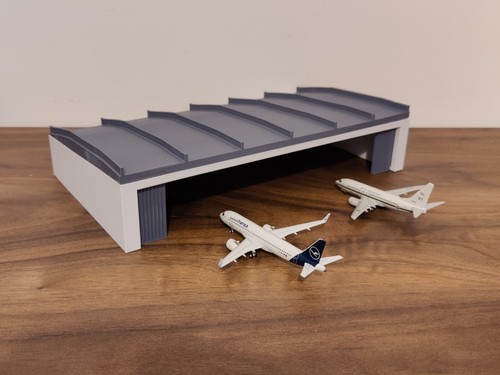 White large aircraft - white, hangar