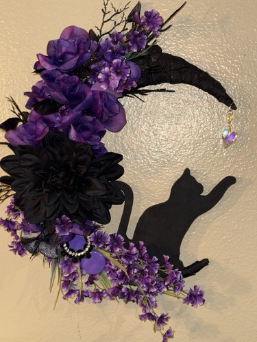 Corona gatto nera floreale