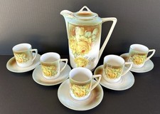 Antico set piattini tazze