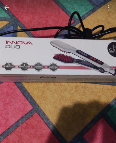 Piastra capelli - x,