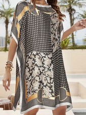 Abito in caftano in seta