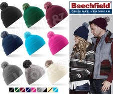 cappello cuffia con pom pon