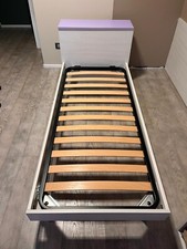 Struttura letto singolo con testata a cassapanca e rete a doghe