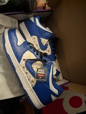 Supreme Nike SB Dunk Low x