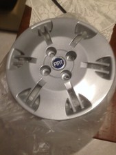 4 borchie nuove, imballate, 