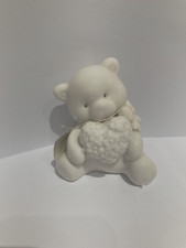 Hervit orsetto seduto con cuore