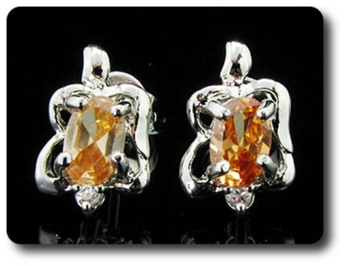 Orecchini zaffiro arancione - orecchini,