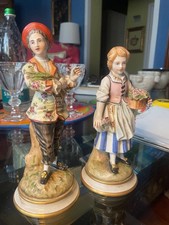 Coppia di statuine di ceramica di Capodimonte originali, in perfette condizioni