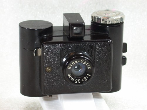 Fotocamera sida extra - sida,