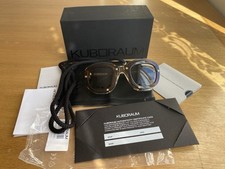 Occhiali da sole rotondi