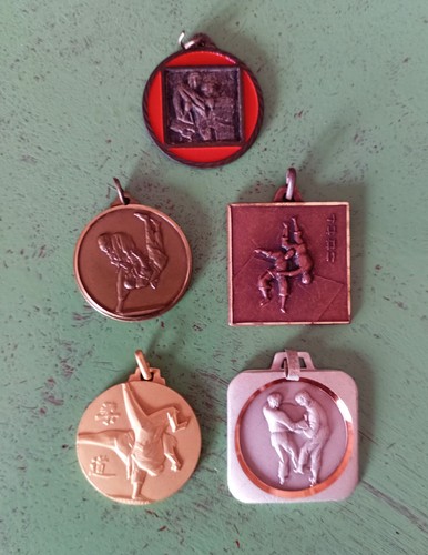 Cinque medaglie judo sport - cinque,