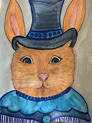 Coniglio con cappello blu