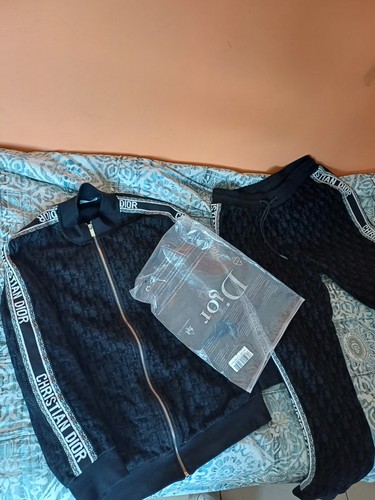 Tuta dior leggi - descrizione,