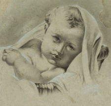 Bambino nella culla, carbone