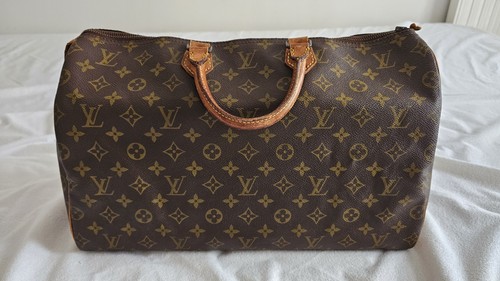 Sac main voyage louis - main,