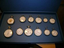 Lotto di 12 orologi da tasca in argento