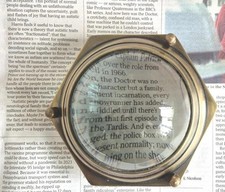 Fermacarte in ottone con lente