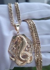 Dije de cobra con cadena de 24