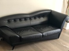 Divano in pelle nera di Design
