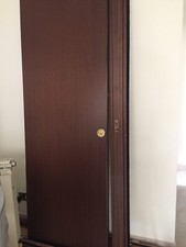 porta scorrevole noce con telaio tipo scrigno