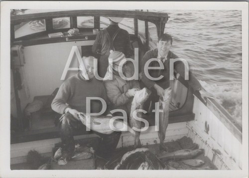 Fishermen with catch - with, on