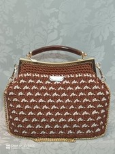 Borse donna lavorate a