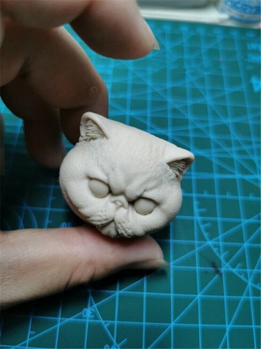 Scultura testa animale gatto