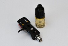 Cuffia, stilo e olio V2 nero