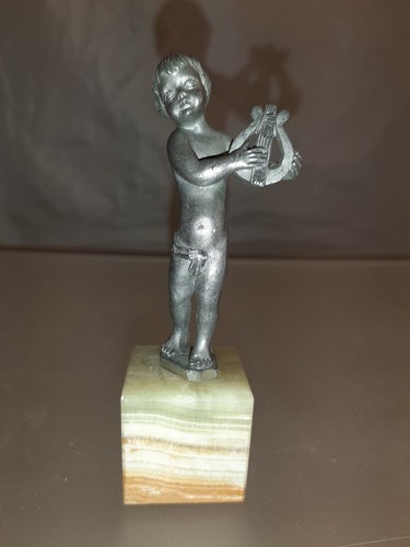 Putto statuina peltro con - in,