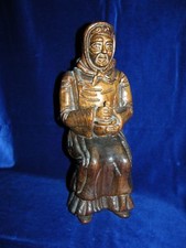 Statua in legno scolpita a