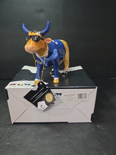 Statuina cow parade joe - cow,