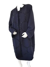 Cappotto e abito spolverino