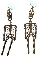 Orecchini a clip SS20 Moschino Couture Jeremy Scott scheletro argento 'TRICK/CHIC'