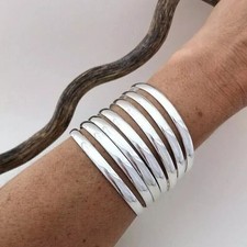 Set di 7 braccialetti argento
